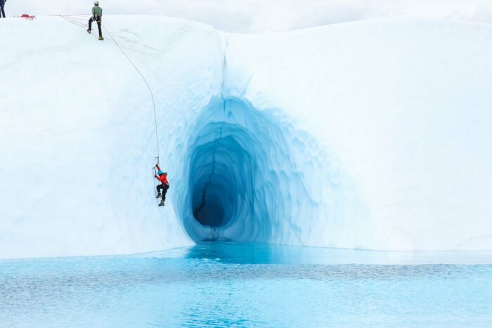Ice Climbing over Blue Water