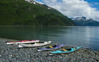 sea kayaks on the Alaskan coast