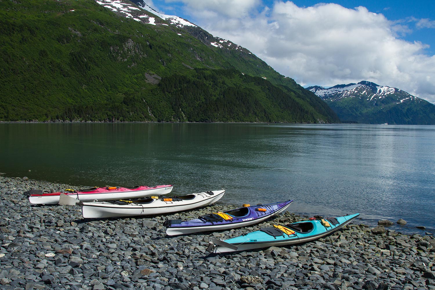 sea kayaks on the Alaskan coast