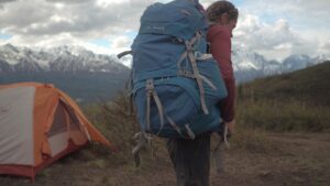 backpack tent mountains person