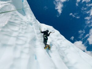 ice wall with climber