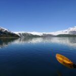 paddle over still water near tidal glaciers