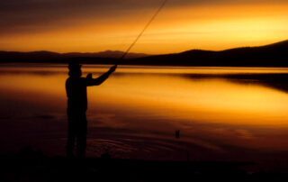 orange sunset fishing in Alaska