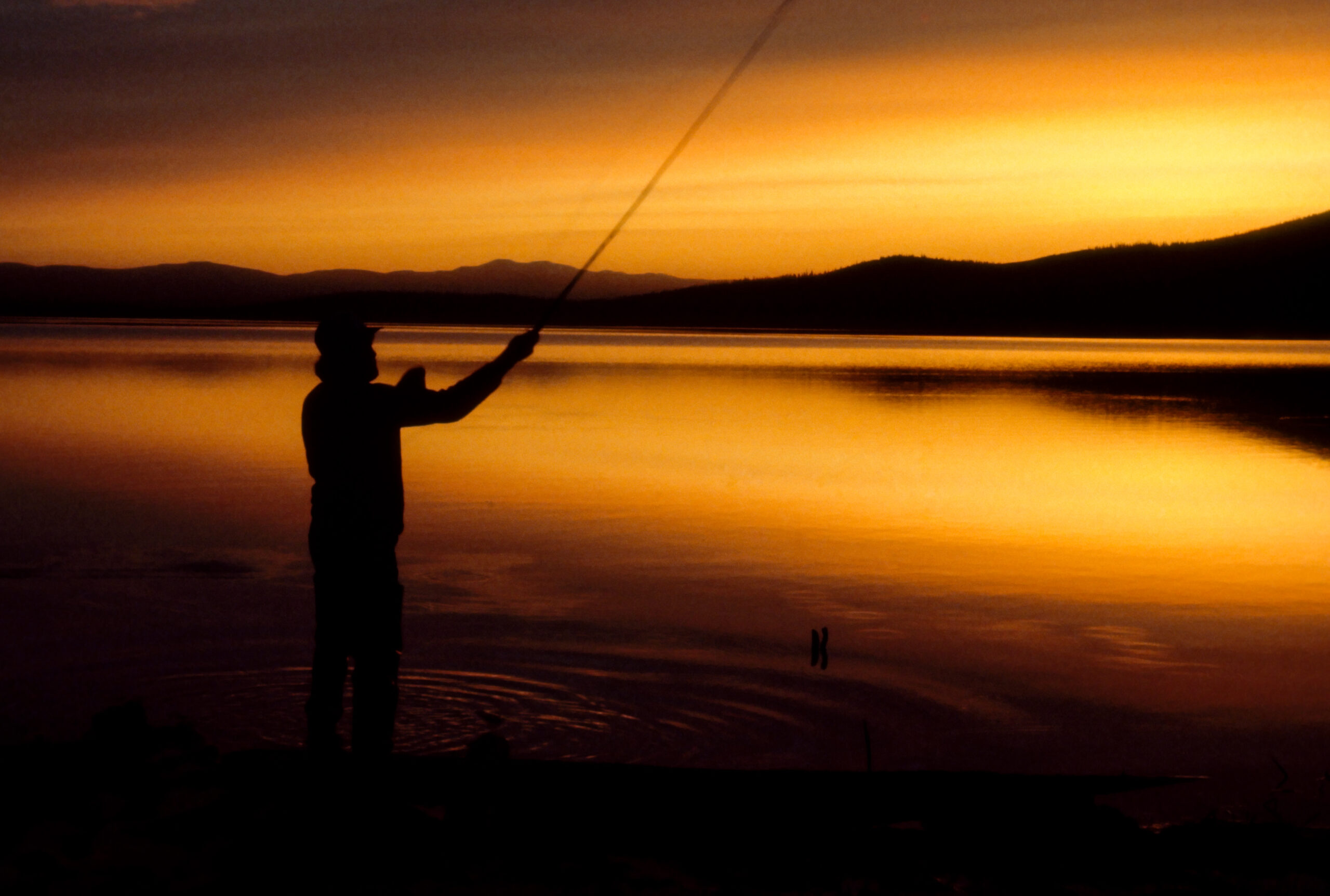 orange sunset fishing in Alaska